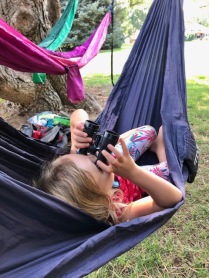 Using binoculars in hammock